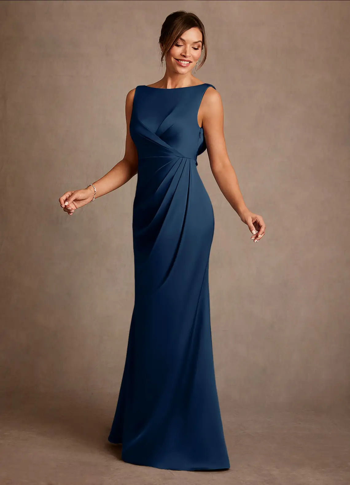 Elegant navy satin mother of the bride dress with a trumpet silhouette, bateau neckline, sleeveless design, and graceful cowl back. Ideal for formal weddings and galas.