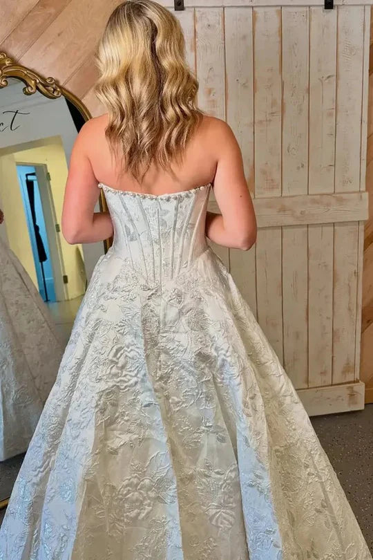 Ivory Strapless Ball Gown Wedding Dress with Beaded Neckline and Jacquard Embroidery