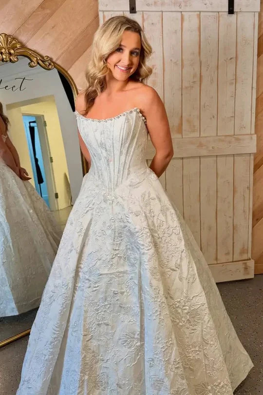 Ivory Strapless Ball Gown Wedding Dress with Beaded Neckline and Jacquard Embroidery