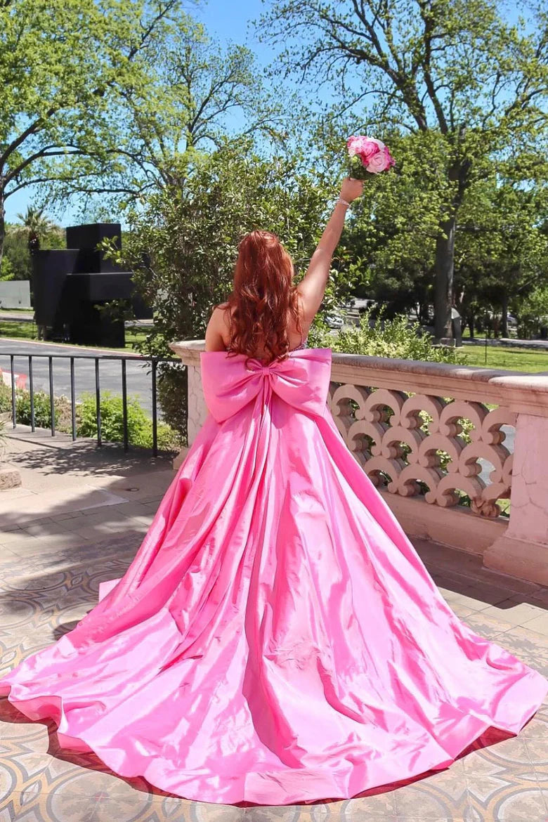 Pink Satin Ball Gown Prom Dress with Beaded Bodice and Oversized Back Bow